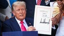WASHINGTON, DC - JULY 04: U.S. President Donald Trump, joined by Republican lawmakers, signs the One, Big Beautiful Bill Act into law during an Independence Day military family picnic on the South Lawn of the White House on July 04, 2025 in Washington, DC. After weeks of negotiations with Republican holdouts Congress passed the One, Big Beautiful Bill Act into law, President Trump’s signature tax and spending bill. The bill makes permanent President Donald Trump’s 2017 tax cuts, increase spending on defense and immigration enforcement and temporarily cut taxes on tips, while cutting funding for Medicaid, food assistance and other social safety net programs. (Photo by Samuel Corum/Getty Images)
 - Fox Business News