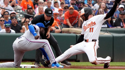 New York Mets third baseman Ronny Mauricio tags Baltimore Orioles designated hitter Jordan Westburg out trying to reach third base during the fourth inning at Oriole Park at Camden Yards, July 10, 2025, in Baltimore, Maryland. - Fox Business News