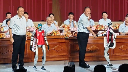 A split image shows humanoid robot Shuang Shuang shaking hands with a teacher and posing for photos during a graduation ceremony at Shuangshi High School in Fujian, China, on July 1, 2025. - Fox Business News