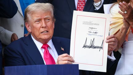 WASHINGTON, DC - JULY 04: U.S. President Donald Trump, joined by Republican lawmakers, signs the One, Big Beautiful Bill Act into law during an Independence Day military family picnic on the South Lawn of the White House on July 04, 2025 in Washington, DC. After weeks of negotiations with Republican holdouts Congress passed the One, Big Beautiful Bill Act into law, President Trump’s signature tax and spending bill. The bill makes permanent President Donald Trump’s 2017 tax cuts, increase spending on defense and immigration enforcement and temporarily cut taxes on tips, while cutting funding for Medicaid, food assistance and other social safety net programs. (Photo by Samuel Corum/Getty Images)
 - Fox Business News