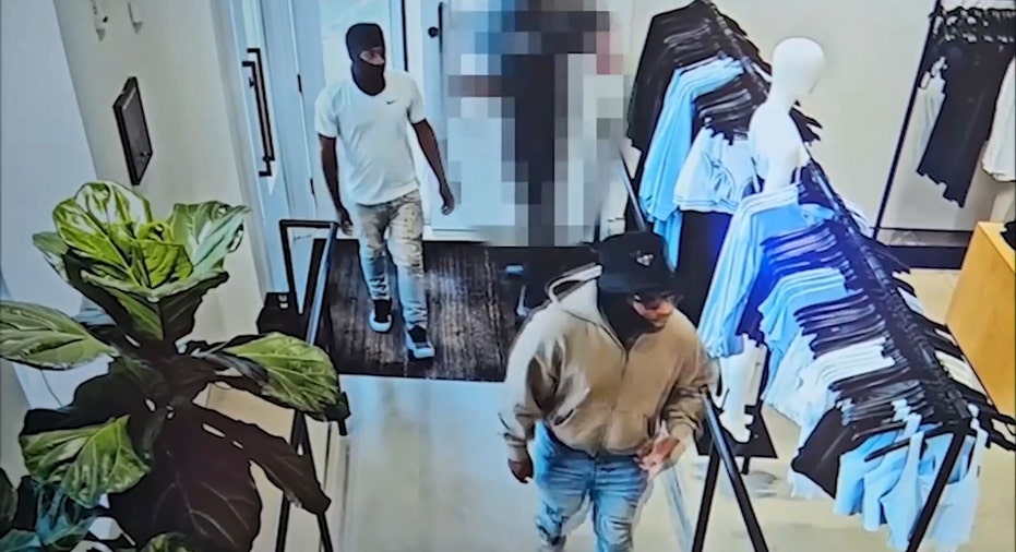 Masked suspects enter the store