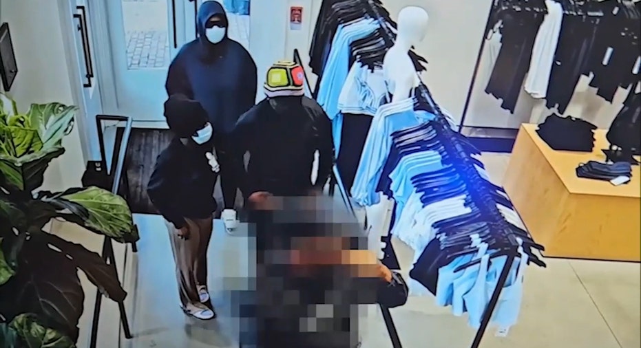 Masked suspects enter the store