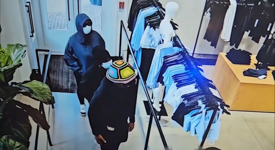 Masked suspects enter the store