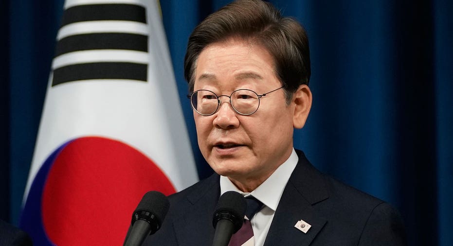 South Korea President Lee Jae-Myung looks on during press conference