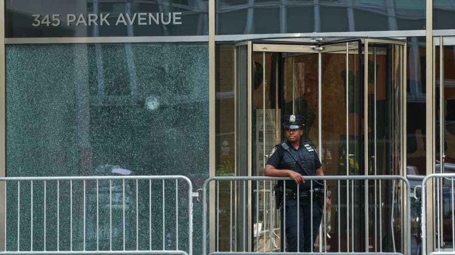 Officers are standing guard after shooting at 345 Park Avenue