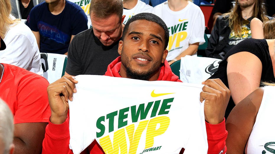 Bobby Wagner attends a Seattle Storm game
