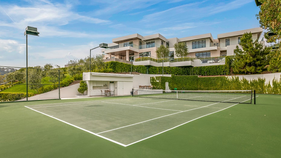 A tennis court can also be found on the property.