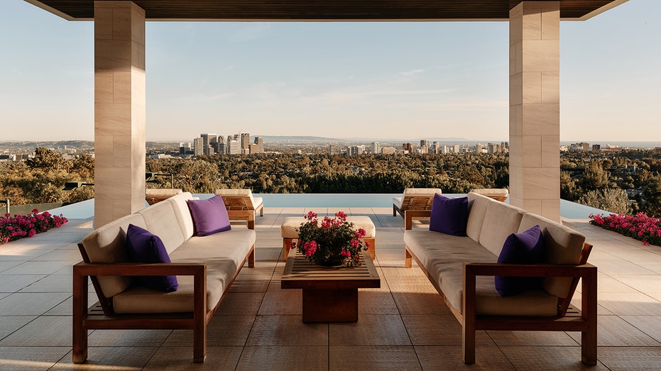 The home boasts many outdoor seating areas with views of the city.