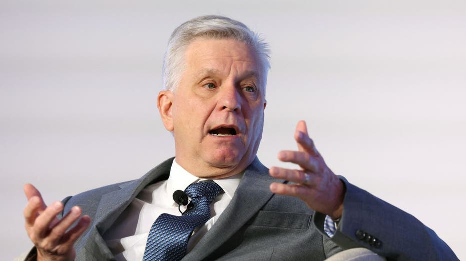 Federal Reserve Governor Christopher Waller gives a speech