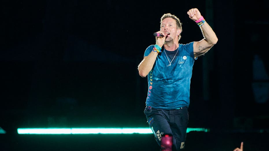 Chris Martin performing during a Coldplay concert