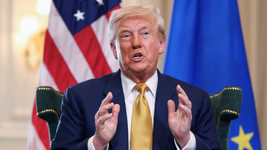 Trump wearing a gold tile and touched his hands while speaking