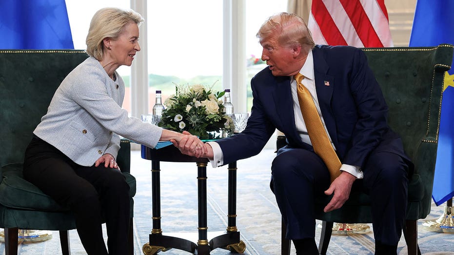President Donald Trump shakes hands with European Commission President Ursula von der Reyen