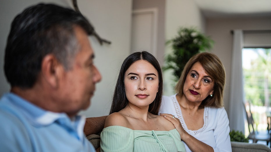 Family talking in the living room