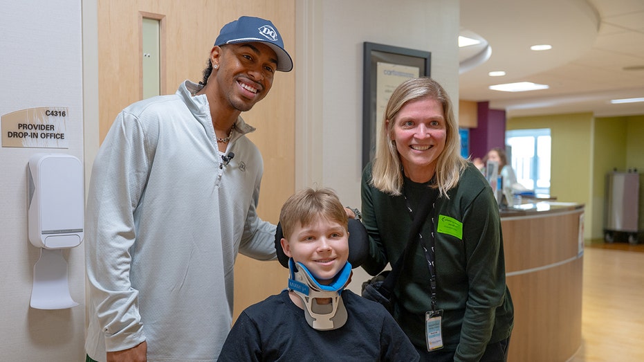 Francisco Lindor smiles with children's hospital patient