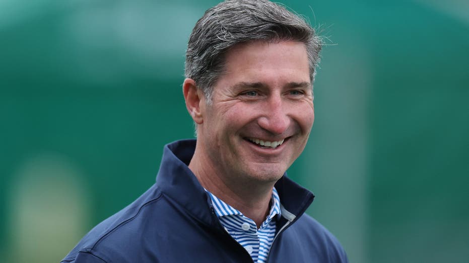 Starbucks CEO smiling