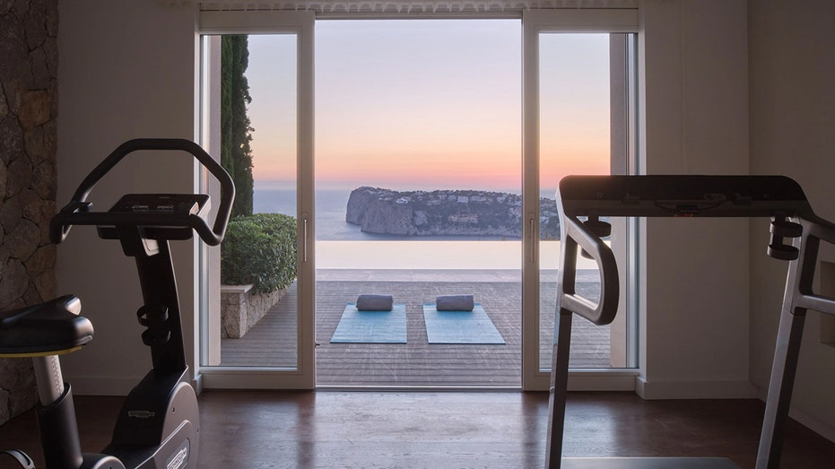 The home also features a gym which looks out on to a stunning view of the ocean.