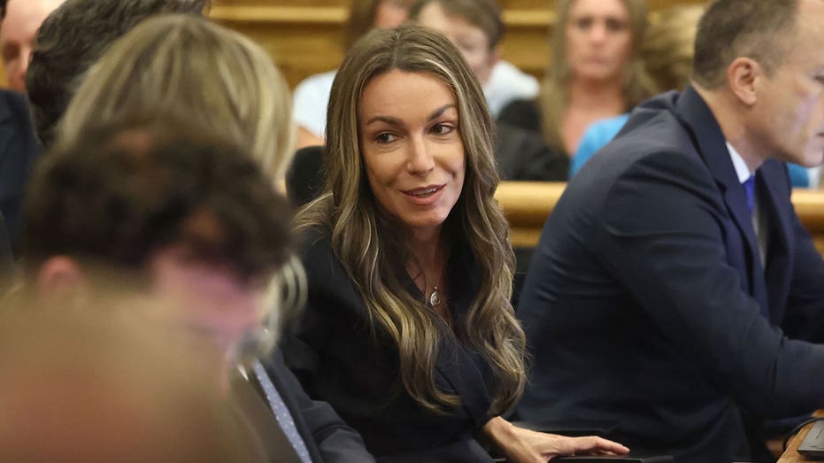 Karen reads the opening of the Second Karen killing attempt on April 22. (Photo Photo Cahill / Boston Herald by Getty Images)