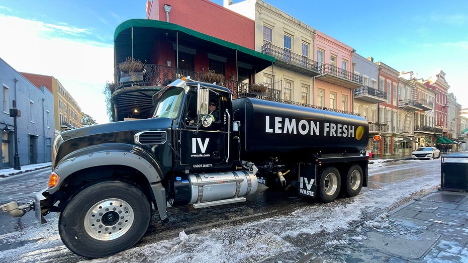 IV Waste Lemon Fresh truck on street in French Quarter during the daytime