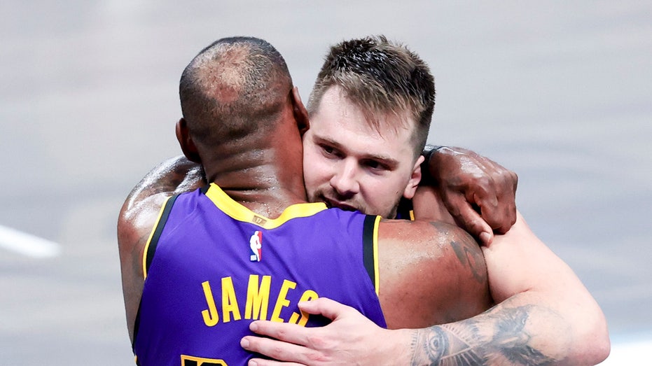 LeBron and Luka hug