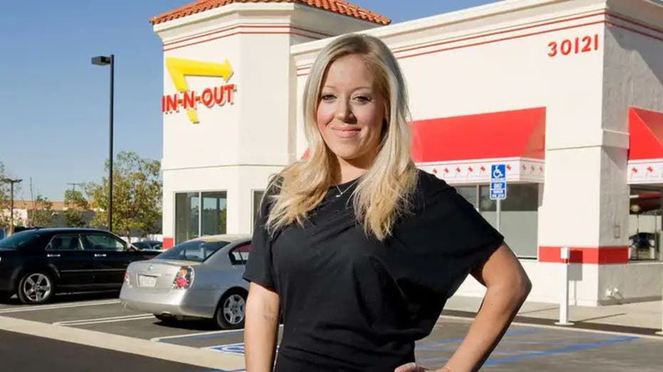  Lynsi Snyder in front of an In-N-Out restaurant