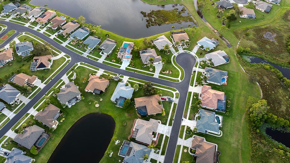 Residential homes in suburban sprawl development in North Port, Florida. Low-density private houses in rural suburbs. Housing market in the USA.