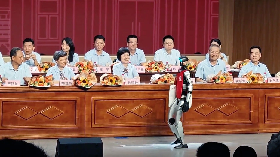 Robot walks onstage at China high school graduation ceremony