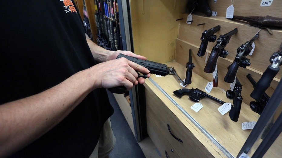 Sig Sauer P320 9mm handgun in shop