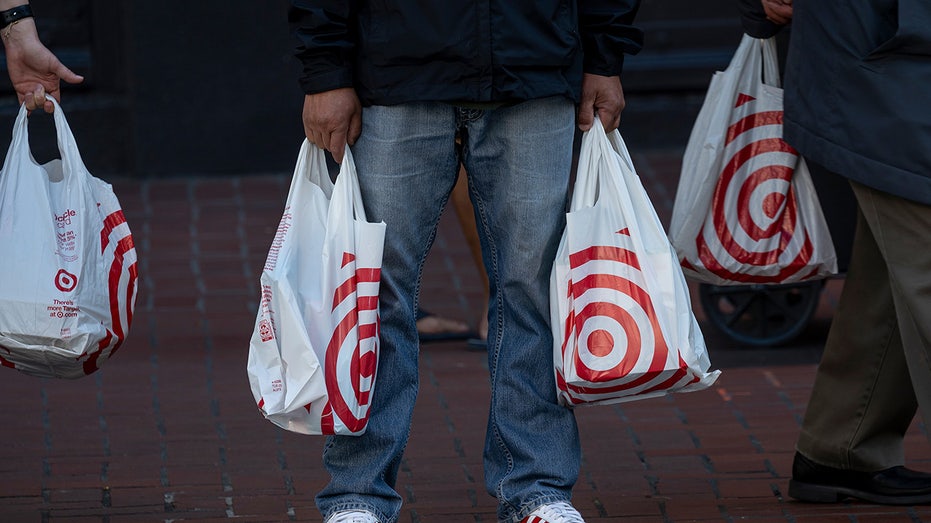 Shoppers carry Target Corp. bags in California