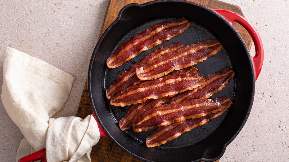 Turkey bacon cooked on a cast iron pan ready to eat