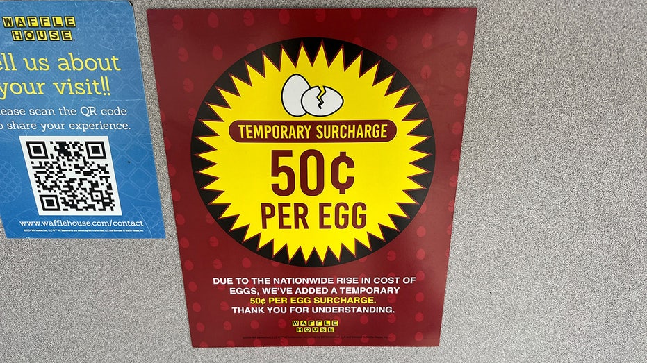 Waffle House egg surcharge sign