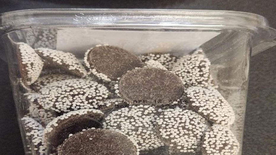 The recalled Wegmans semi-sweet chocolate nonpareils came in 18.5-ounce tubs