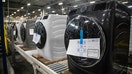 A shot of GE Appliances' washer and dryers sitting on shelf of a factory. - Fox Business News