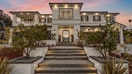 The front of 6389 Castejon, a property for sale in La Jolla, a neighborhood in San Diego. The home just entered a Dutch Auction, where its list price drops each week. - Fox Business News