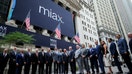 Thomas Gallagher, chairman and chief executive officer of Miami International Holdings (MIAX), center, during the company's initial public offering (IPO) at the New York Stock Exchange (NYSE) in New York, US, on Thursday, Aug. 14, 2025.  - Fox Business News