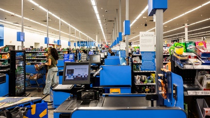 Automatic checkouts with cashiers and customers in the aisles of a Walmart store and supermarket in Florida City in the state of Florida in the United States of America (USA) on August 5, 2025. (Photo by Jc Milhet / Hans Lucas via AFP) (Photo by JC MILHET/Hans Lucas/AFP via Getty Images) - Fox Business News