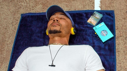 Los Angeles Dodgers All-Star Mookie Betts closes his eyes listening to "Playa Sounds," a soundtrack he helped create with Corona.  - Fox Business News