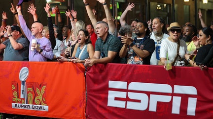 Fans cheer at an ESPN broadcast ahead of Super Bowl LIX between the Kansas City Chiefs and the Philadelphia Eagles on February 7, 2025, in New Orleans, LA.  - Fox Business News