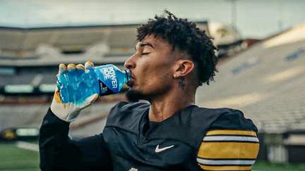 University of Iowa's Xavier Nwankpa drinks Powerade as part of the brand's "It Takes More" campaign ahead of the 2025 college football season.  - Fox Business News