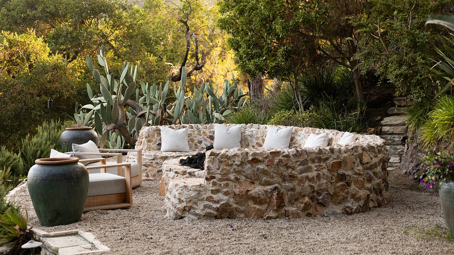 The home also features a fire pit in the backyard.