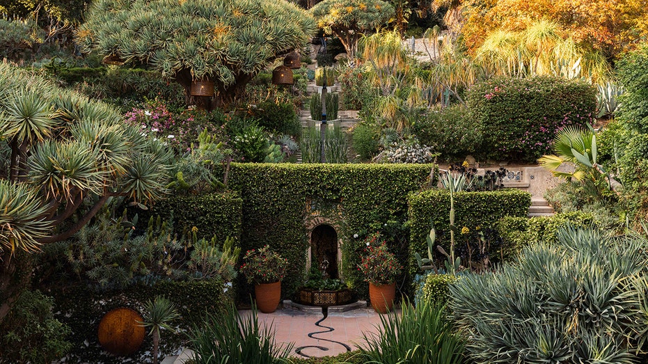 The landscaped grounds feature many gardens.