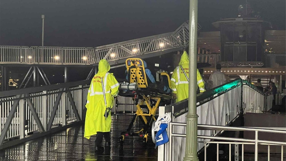 Person being loaded onto a strecher