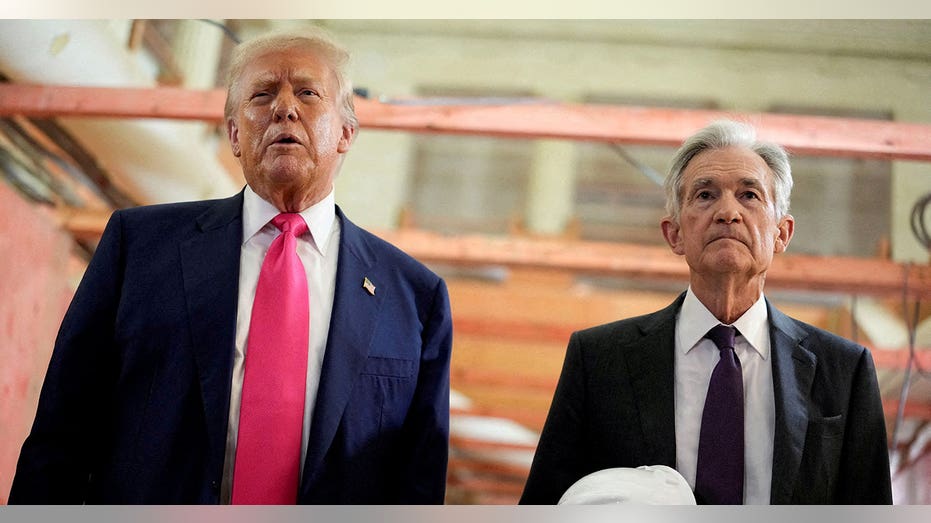 President Donald Trump and Federal Reserve Chairman Jerome Powell stands next to each other
