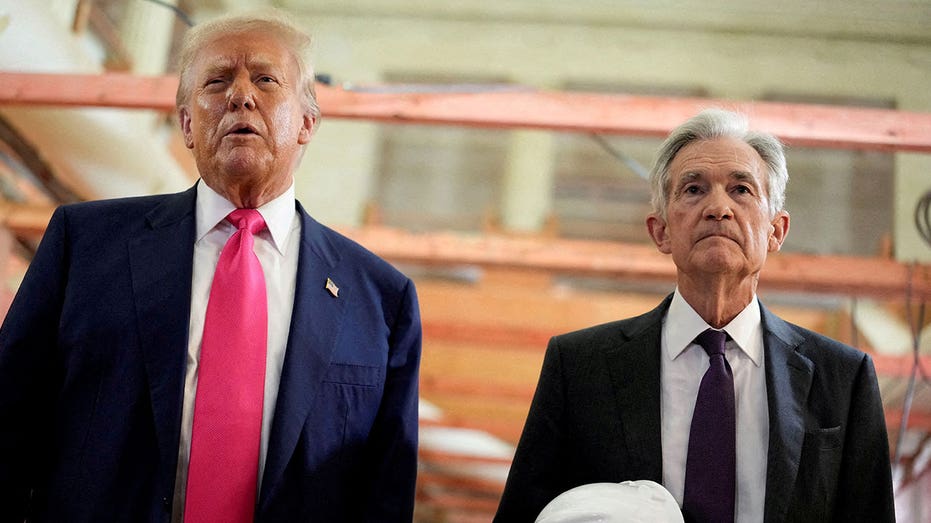 President Donald Trump and Federal Reserve Chair Jerome Powell standing next to each other