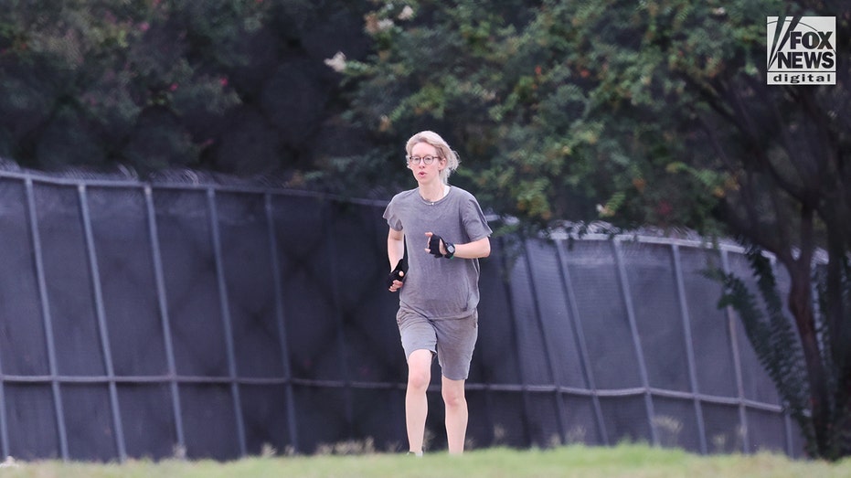 Theranos CEO Elizabeth Holmes exercises in federal jail.