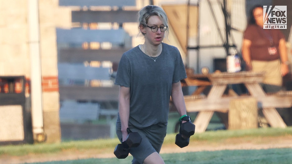 Theranos CEO Elizabeth Holmes exercises in federal jail.