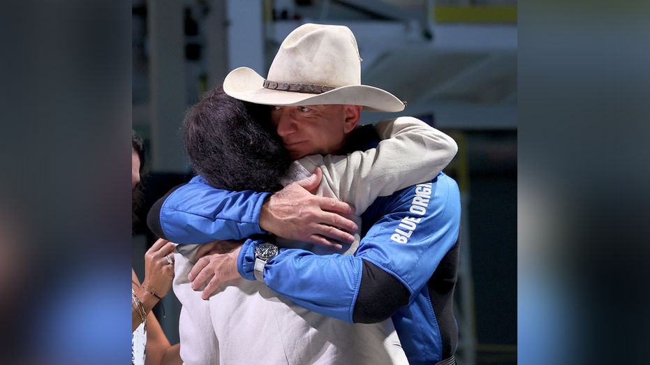 Jeff Bezos hugging his mother