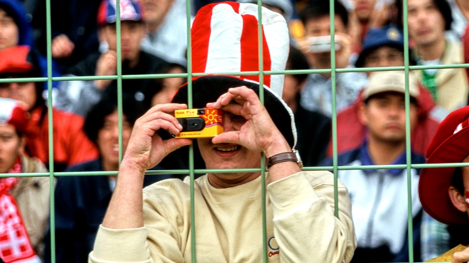 Denmark Fan using Kodak disposable camera at 1998 FIFA World Cup