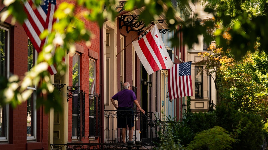 Columbia and the United States teach outside a house in the Capitol Hill neighborhood in Washington, DC,