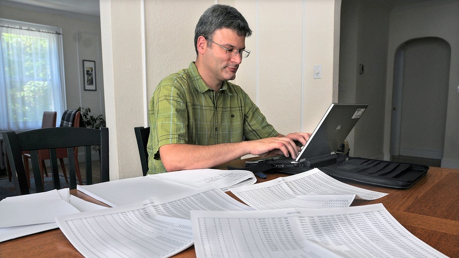 Man with credit reports