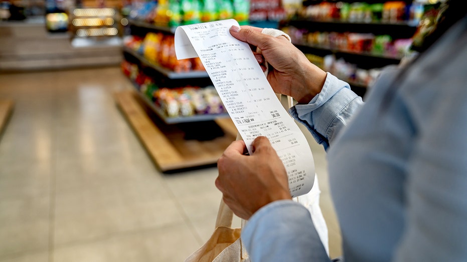 Close-up on a woman shopping at a convenience store